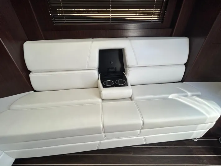 Aguabendita Yacht Photos Pics Luxurious white leather seating with cup holders in 2019 Monterey 345 Sport Yacht.