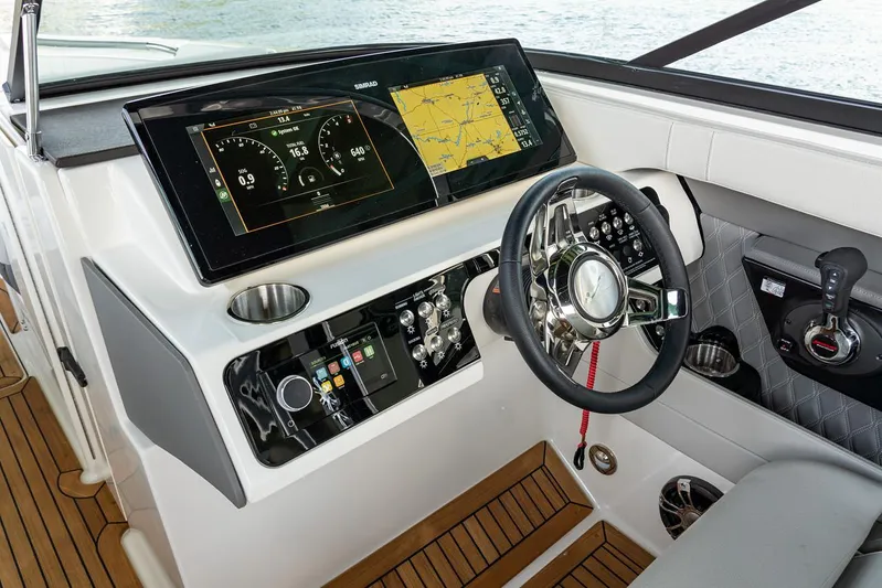  Yacht Photos Pics Manufacturer Provided Image: 2023 Sea Ray SLX 280 helm with advanced navigation and control systems.