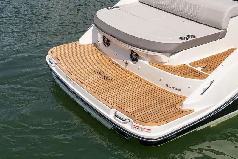  Yacht Photos Pics Manufacturer Provided Image: 2023 Sea Ray SLX 280 boat stern with teak swim platform.