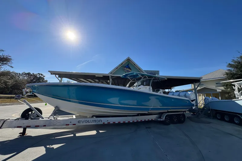  Yacht Photos Pics 2016 Nor-Tech 390 Sport Center Console boat on trailer under sunny sky.