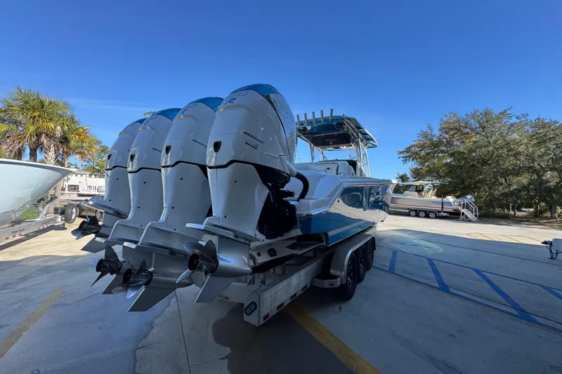  Yacht Photos Pics 2016 Nor-Tech 390 Sport Center Console boat with multiple outboard engines on a trailer.