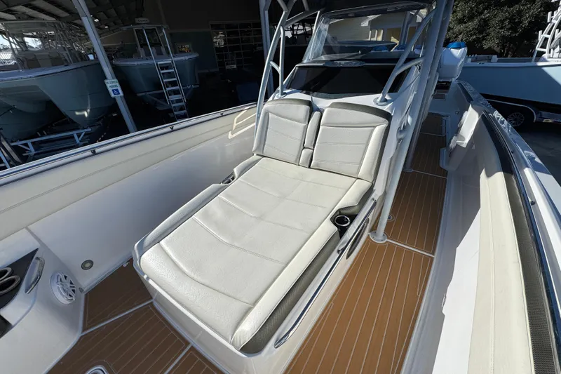  Yacht Photos Pics 2016 Nor-Tech 390 Sport Center Console with cushioned seating and sleek design.