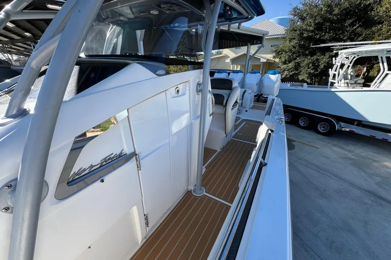  Yacht Photos Pics 2016 Nor-Tech 390 Sport Center Console boat with sleek design and spacious deck.