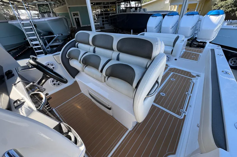  Yacht Photos Pics 2016 Nor-Tech 390 Sport Center Console with luxurious seating and multiple outboard engines.