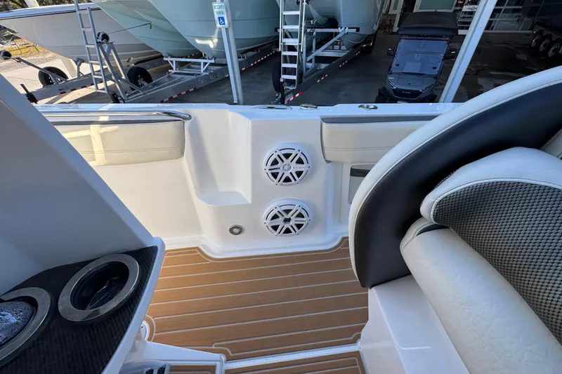  Yacht Photos Pics 2016 Nor-Tech 390 Sport Center Console interior with speakers and seating.