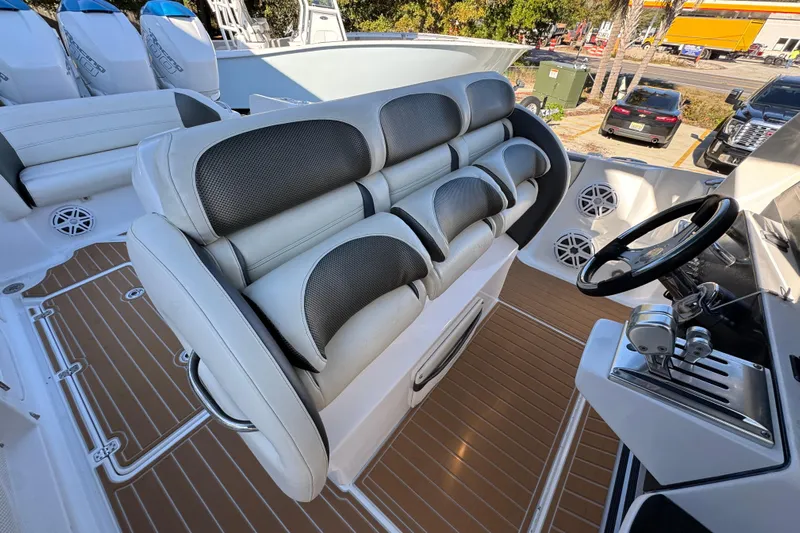  Yacht Photos Pics 2016 Nor-Tech 390 Sport Center Console interior with plush seating and modern controls.