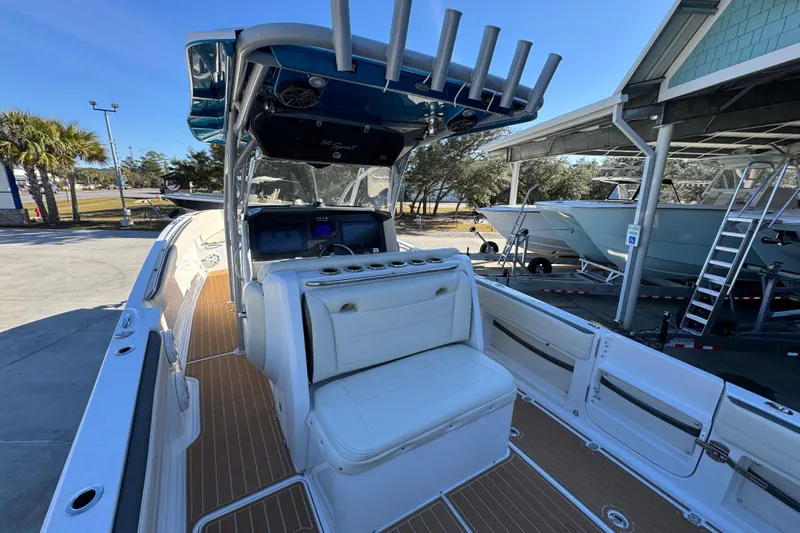  Yacht Photos Pics 2016 Nor-Tech 390 Sport Center Console boat with white seating and wood-style flooring.