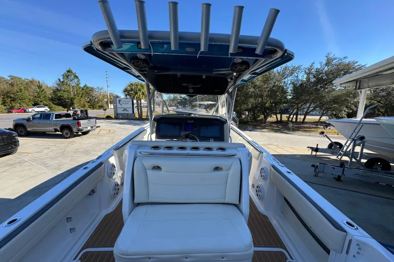  Yacht Photos Pics 2016 Nor-Tech 390 Sport Center Console boat with white seating and rod holders.