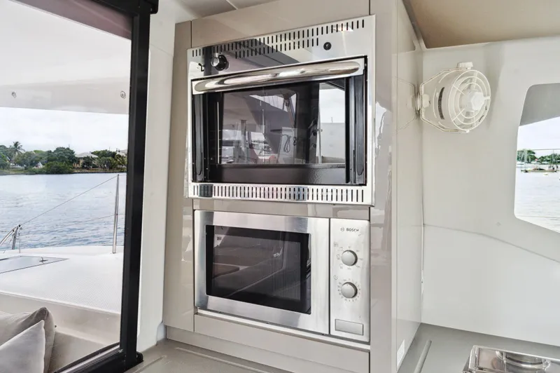 Sabai Sabai Yacht Photos Pics Modern kitchen appliances on 2018 Fountaine Pajot Lucia 40 catamaran.