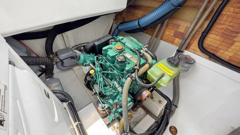 Sabai Sabai Yacht Photos Pics Engine compartment of 2018 Fountaine Pajot Lucia 40 catamaran, showcasing mechanical components.