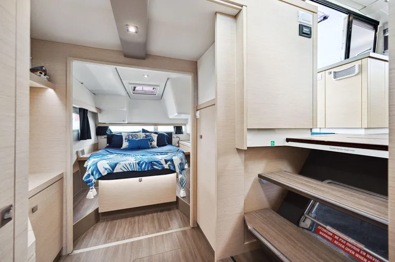 Sabai Sabai Yacht Photos Pics Interior of 2018 Fountaine Pajot Lucia 40 catamaran, featuring a cozy bedroom and modern design.