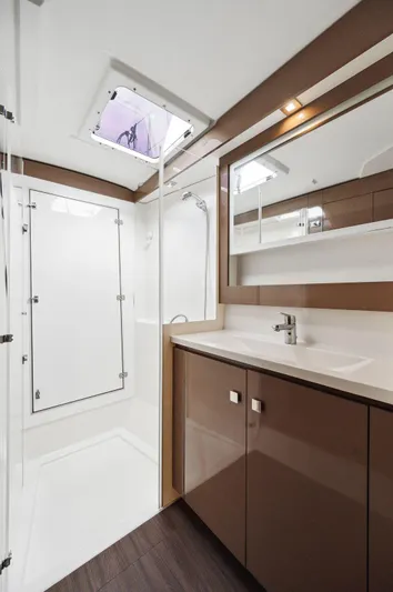 Sabai Sabai Yacht Photos Pics Modern bathroom interior of 2018 Fountaine Pajot Lucia 40 catamaran.