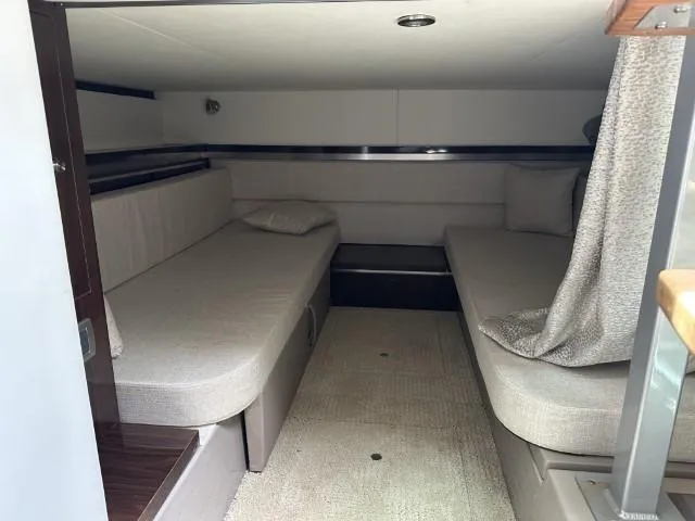  Yacht Photos Pics Interior cabin of 2022 Sea Ray Sundancer 320 with twin beds and modern decor.