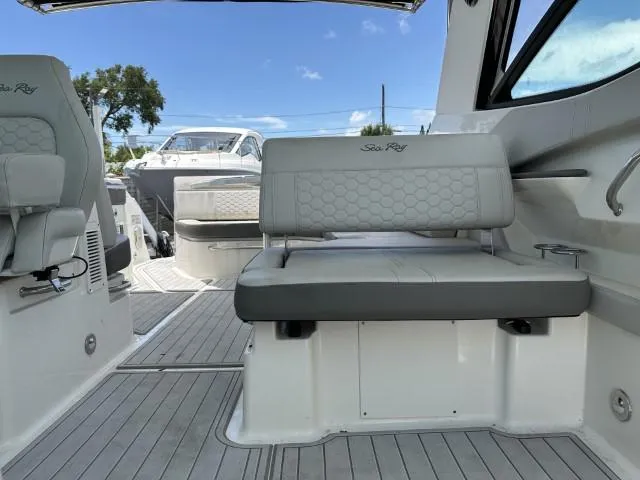  Yacht Photos Pics 2022 Sea Ray Sundancer 320 interior with gray seating and sleek design.
