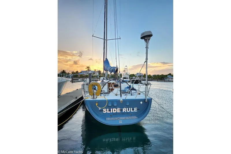  Yacht Photos Pics Beneteau First 44.7 sailboat docked at sunset, 2005 model.