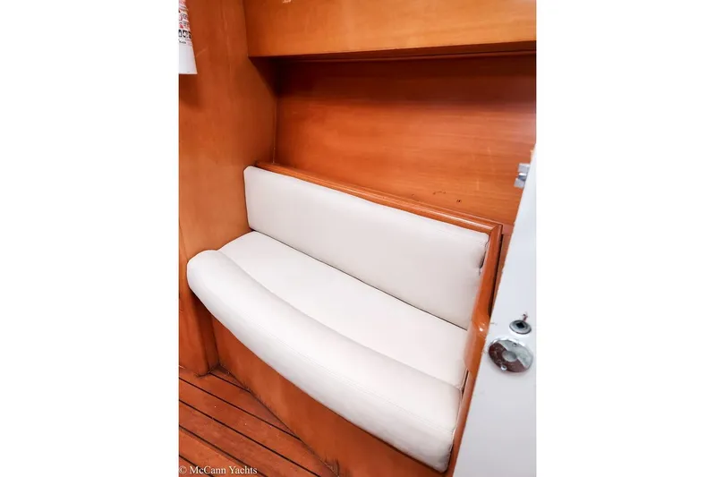  Yacht Photos Pics Cozy seating area in 2005 Beneteau First 44.7 yacht with wooden interior.