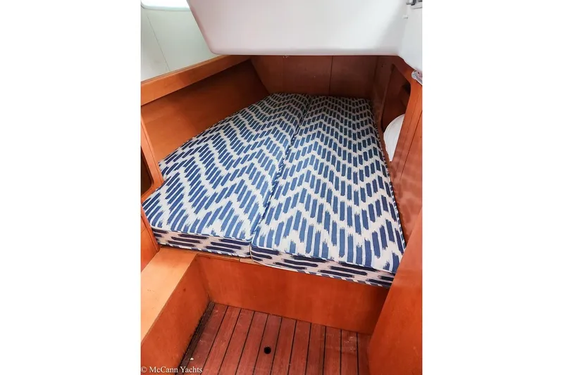  Yacht Photos Pics Cozy cabin bed with patterned mattress on 2005 Beneteau First 44.7 yacht.
