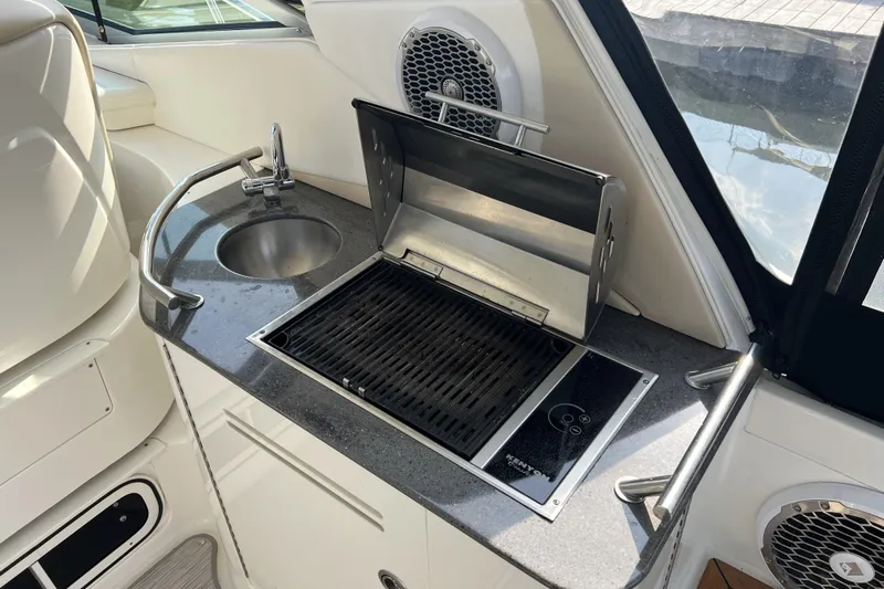  Yacht Photos Pics Luxury yacht kitchen with grill and sink on 2012 Sea Ray 370 Sundancer.