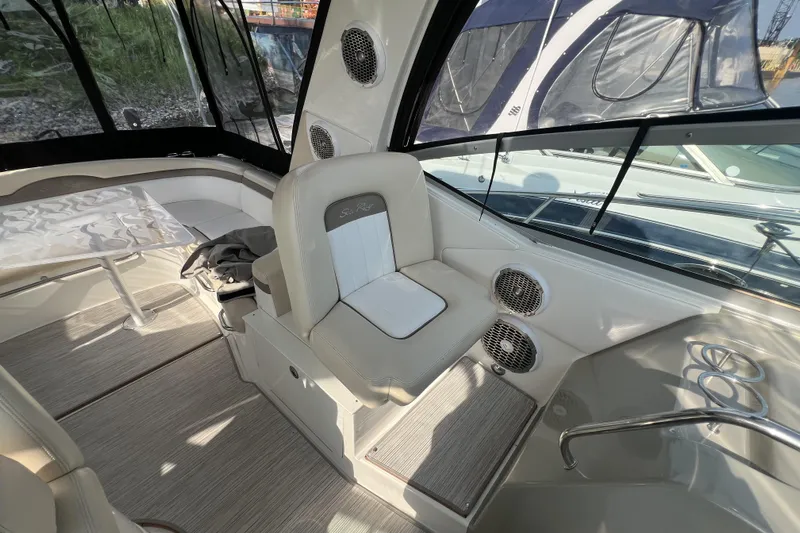  Yacht Photos Pics Interior of 2012 Sea Ray 370 Sundancer boat with seating and table.