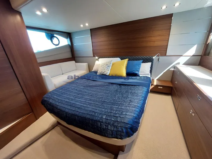  Yacht Photos Pics Luxurious bedroom interior of 2020 Princess V50 yacht with modern design and cozy bedding.