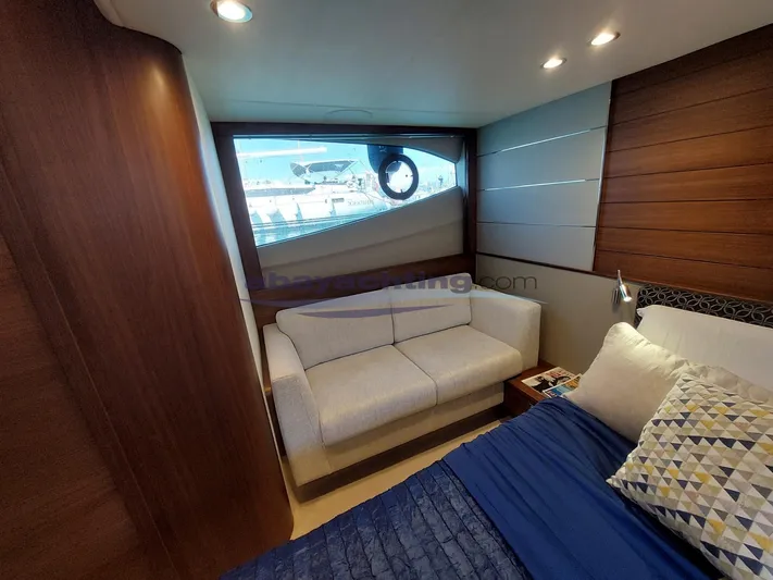  Yacht Photos Pics Luxurious interior of 2020 Princess V50 yacht with sofa and bed.