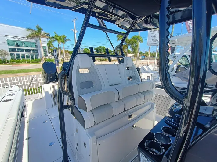 332-299 Yacht Photos Pics 2025 Blackfin 332 CC boat interior with modern seating and sleek design.