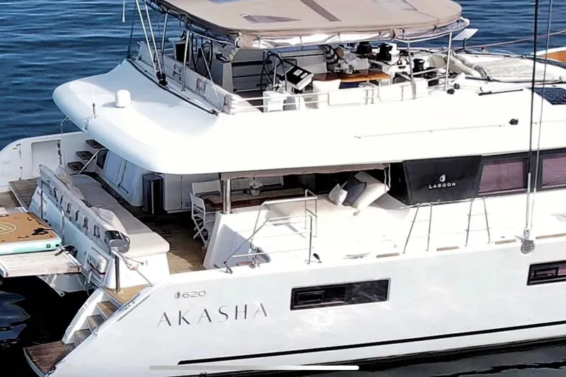  Yacht Photos Pics 2018 Lagoon 620 yacht "Akasha" with spacious deck and modern design on the water.