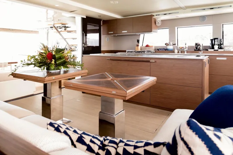  Yacht Photos Pics Luxurious interior of 2018 Lagoon 620 yacht with modern kitchen and elegant decor.