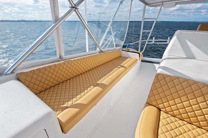 Bait Waster Yacht Photos Pics Luxurious seating on a 2001 Viking 61 yacht with ocean view.