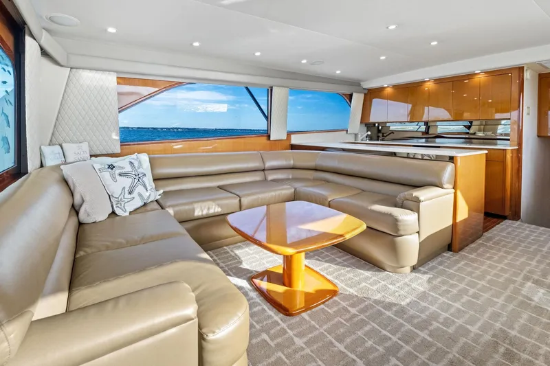 Bait Waster Yacht Photos Pics Luxurious interior of 2001 Viking 61 yacht with leather seating and ocean view.