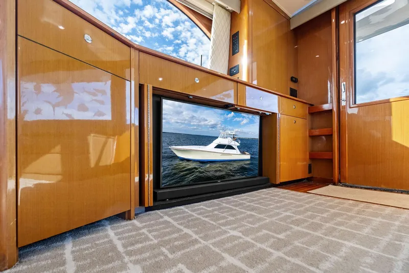 Bait Waster Yacht Photos Pics Interior of 2001 Viking 61 yacht with wooden cabinetry and ocean view.