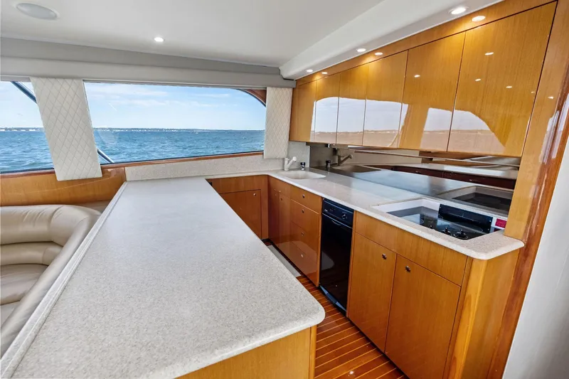 Bait Waster Yacht Photos Pics Luxurious kitchen interior of 2001 Viking 61 yacht with ocean view.