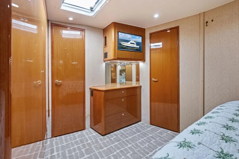 Bait Waster Yacht Photos Pics Luxurious interior of 2001 Viking 61 yacht with wood finishes and modern amenities.