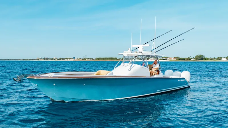 Off Course (name Reserved) Yacht Photos Pics 2018 Winter Custom Yachts 37 Custom Carolina boat on blue ocean water.