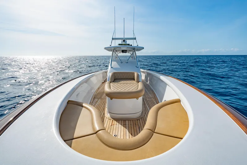 Off Course (name Reserved) Yacht Photos Pics 2018 Winter Custom Yachts 37 Custom Carolina on open sea, featuring elegant deck seating.