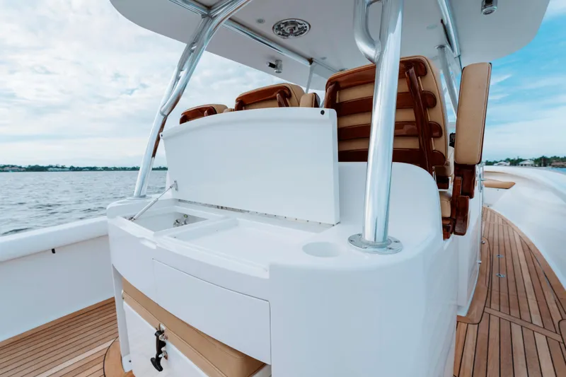 Off Course (name Reserved) Yacht Photos Pics 2018 Winter Custom Yachts 37 Custom Carolina boat interior with sleek design and wooden deck.