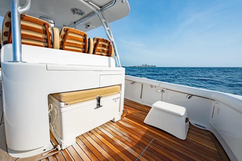 Off Course (name Reserved) Yacht Photos Pics 2018 Winter Custom Yachts 37 Custom Carolina boat with teak deck, ocean view, and cushioned seating.