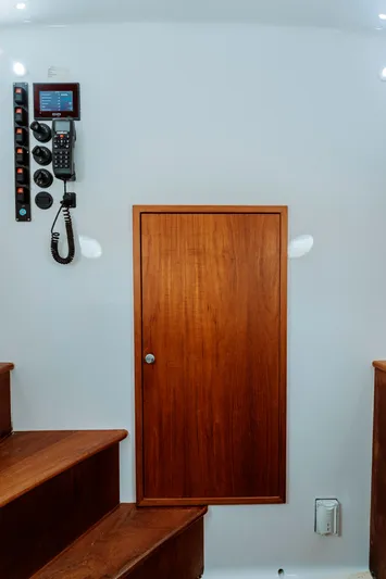 Off Course (name Reserved) Yacht Photos Pics Interior of 2018 Winter Custom Yachts 37 Custom Carolina, featuring wooden door and control panel.