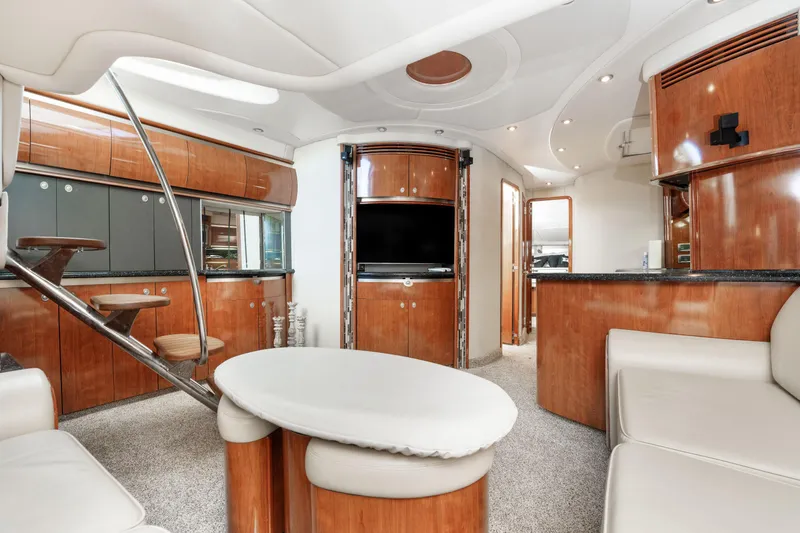 Jo's Diamond Yacht Photos Pics Luxurious interior of 2004 Sea Ray 500 Sundancer yacht with elegant wood finishes.