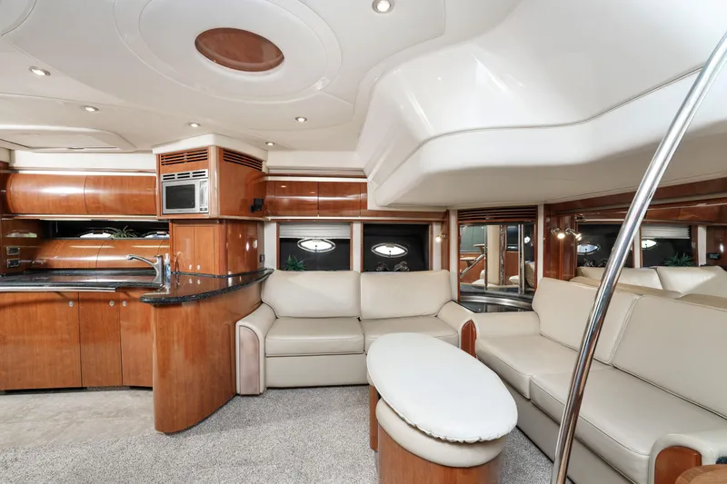 Jo's Diamond Yacht Photos Pics Luxurious interior of 2004 Sea Ray 500 Sundancer yacht with modern furnishings.