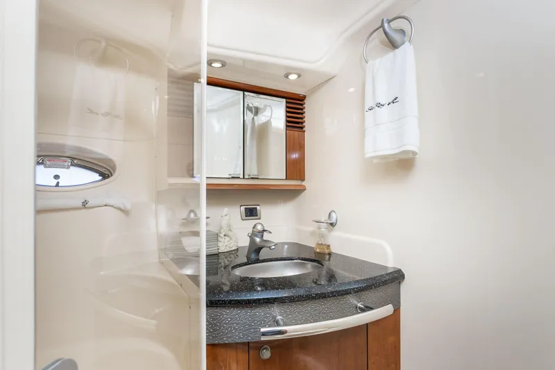 Jo's Diamond Yacht Photos Pics Luxurious bathroom in 2004 Sea Ray 500 Sundancer yacht with modern fixtures.