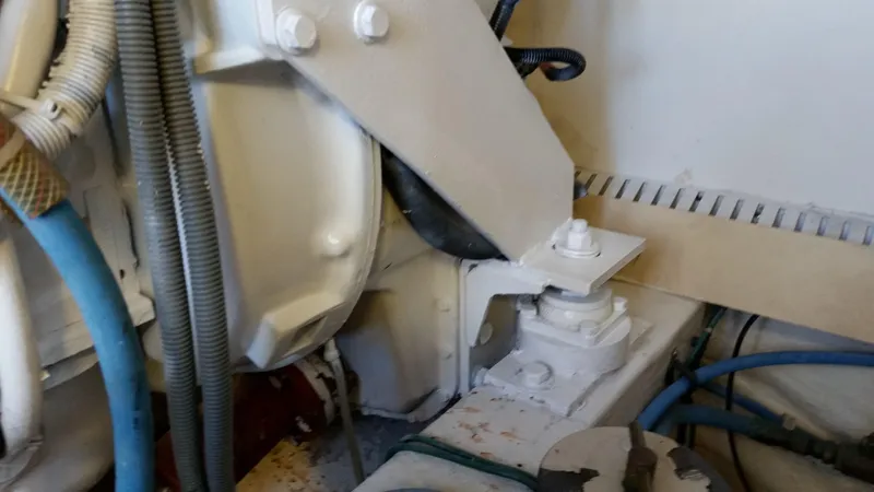 Mai Time Yacht Photos Pics Engine room detail of a 2001 Bertram 390 Convertible boat, showing mechanical components and wiring.