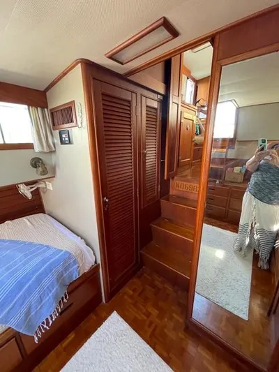 Padre Pio Yacht Photos Pics Interior of 1986 Grand Banks 42 Classic yacht with wooden finishes and cozy cabin space.