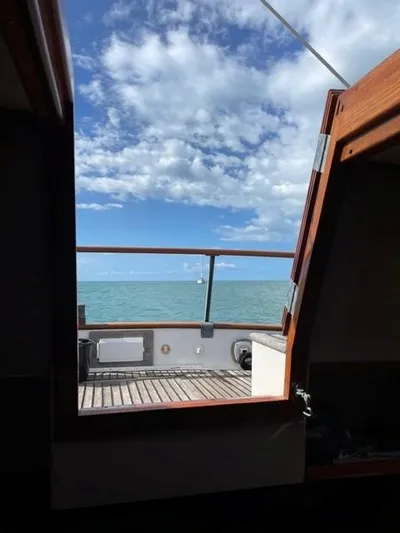 Padre Pio Yacht Photos Pics View from 1986 Grand Banks 42 Classic yacht, open door to ocean and sky.