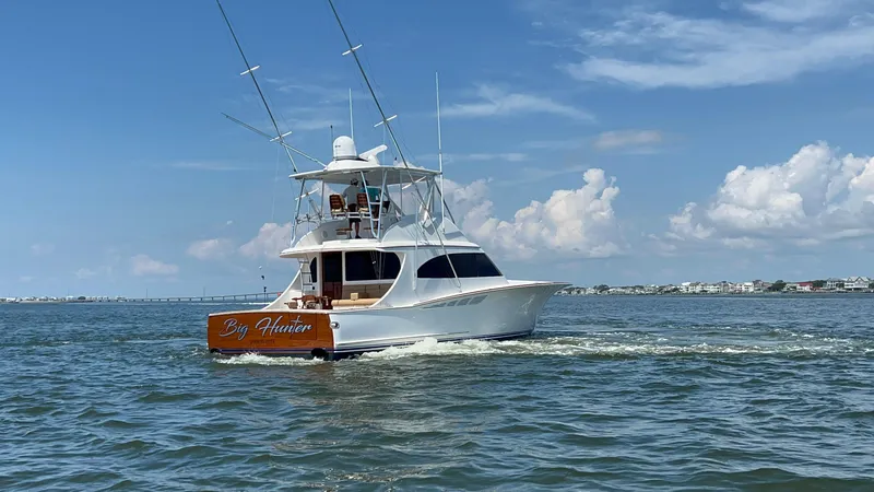  Yacht Photos Pics 2024 Custom Carolina Albemarle Spencer yacht cruising on open water.