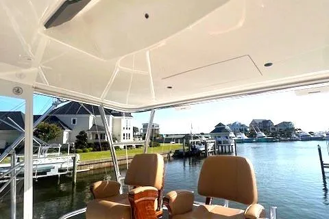 Yacht Photos Pics 2024 Custom Carolina Albemarle Spencer boat interior with waterfront view.