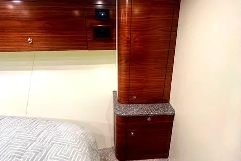  Yacht Photos Pics Luxurious 2024 Custom Carolina Albemarle Spencer yacht interior with wood cabinetry and modern design.