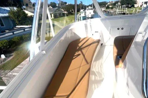  Yacht Photos Pics 2024 Custom Carolina Albemarle Spencer boat interior with tan seating and sleek design.