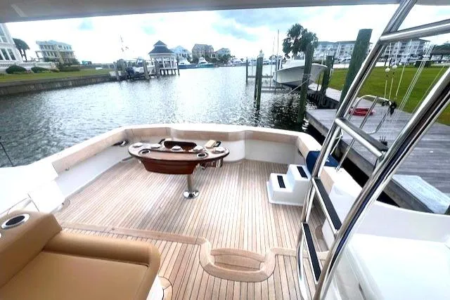  Yacht Photos Pics 2024 Custom Carolina Albemarle Spencer yacht with spacious deck overlooking marina.