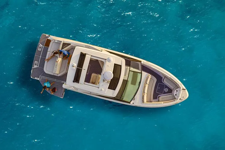  Yacht Photos Pics Manufacturer Provided Image: Aerial view of 2022 Sea Ray SLX 400 boat on clear blue water.